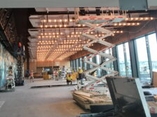 Commercial Marsden Electrical Contractors setting up a large commercial room ceiling lights