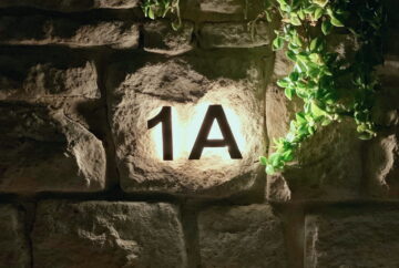 Street Address light street address light in sandstone wall