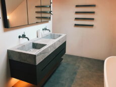 lightd underneath vanity in a bathroom