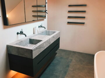 lightd underneath vanity in a bathroom