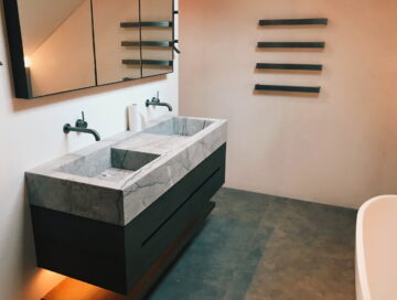 lightd underneath vanity in a bathroom